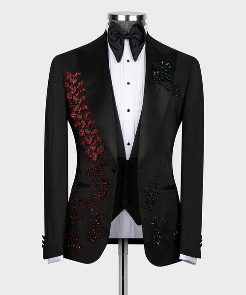 Black tuxedo with red/green crystal floral embroidery, black bow tie, white shirt