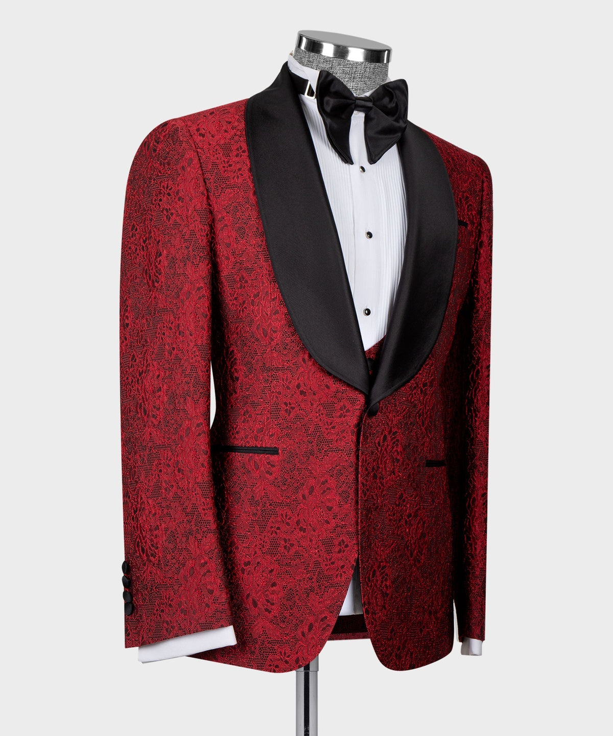 Red tuxedo jacket front with black shawl lapels and black bow tie