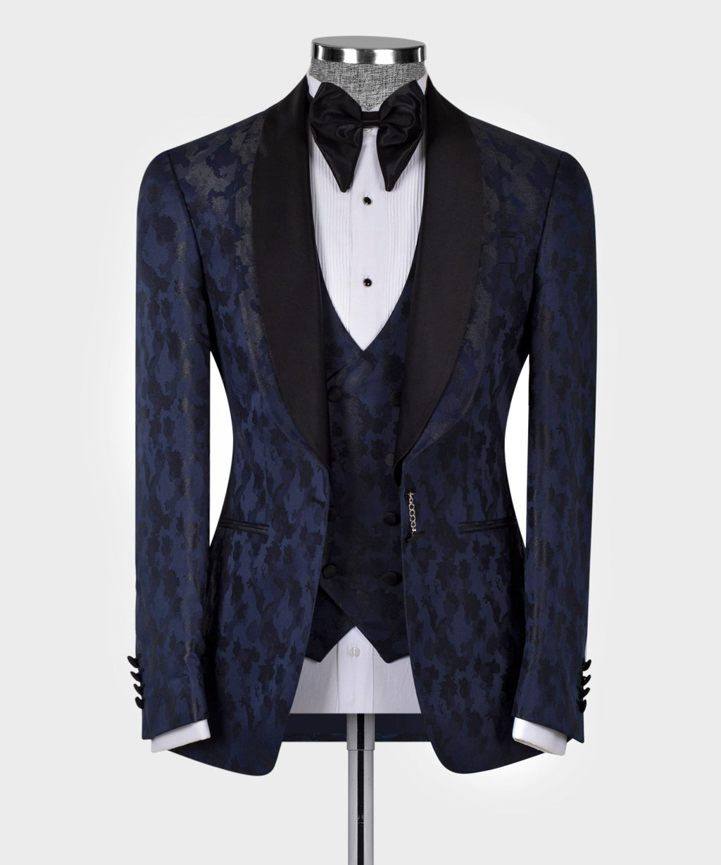 Navy tuxedo jacket with black double satin lapels, bow tie, and white shirt front