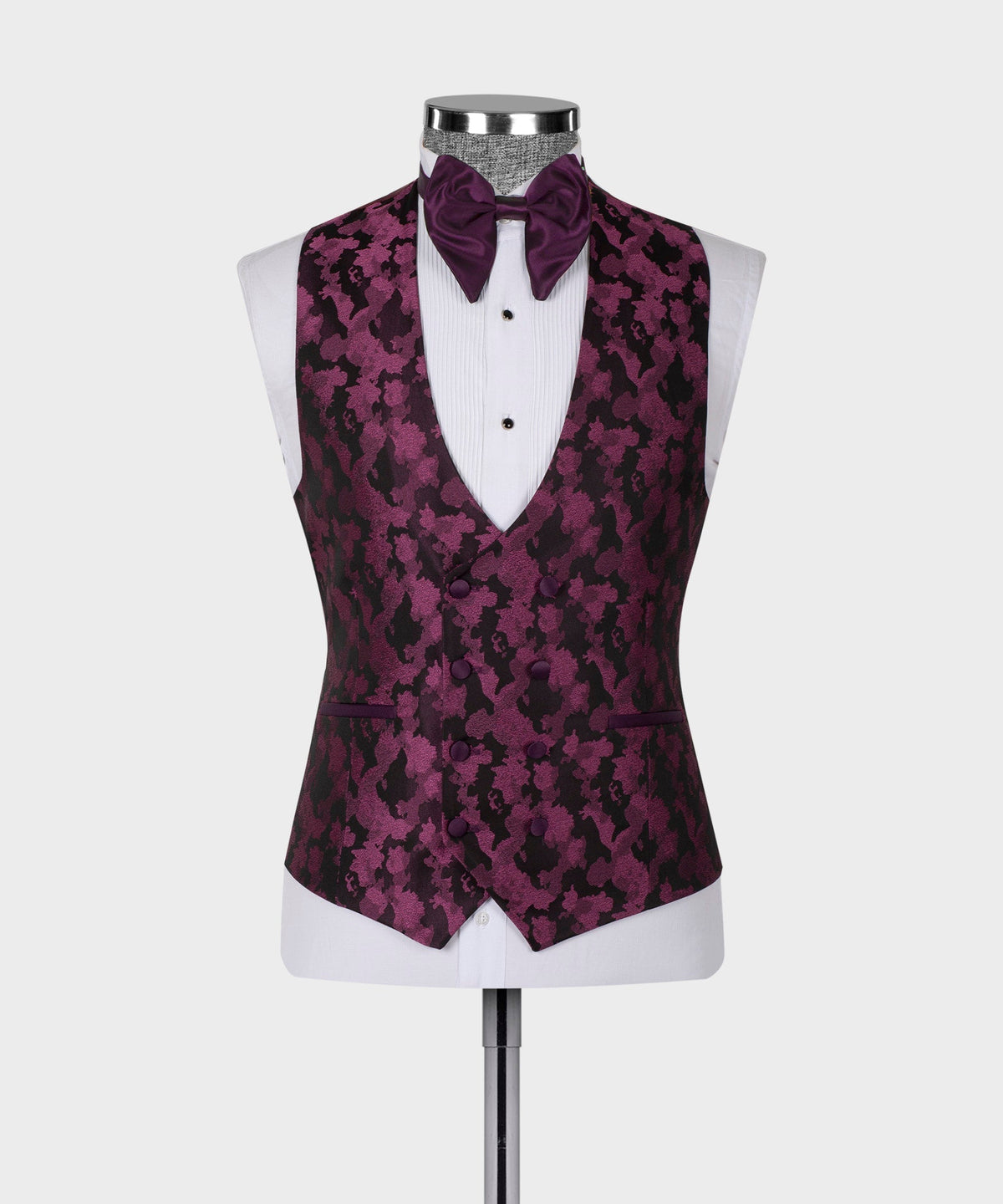Purple patterned tuxedo vest with white shirtfront and bow tie, double-lapel styling