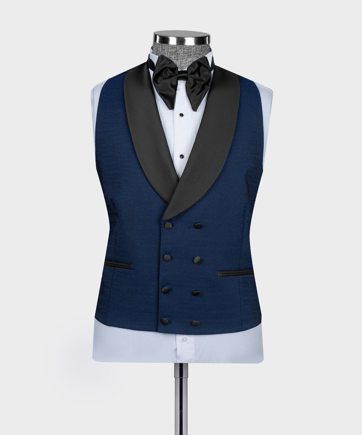 Blue tuxedo waistcoat with black satin lapels, bow tie and white dress shirt