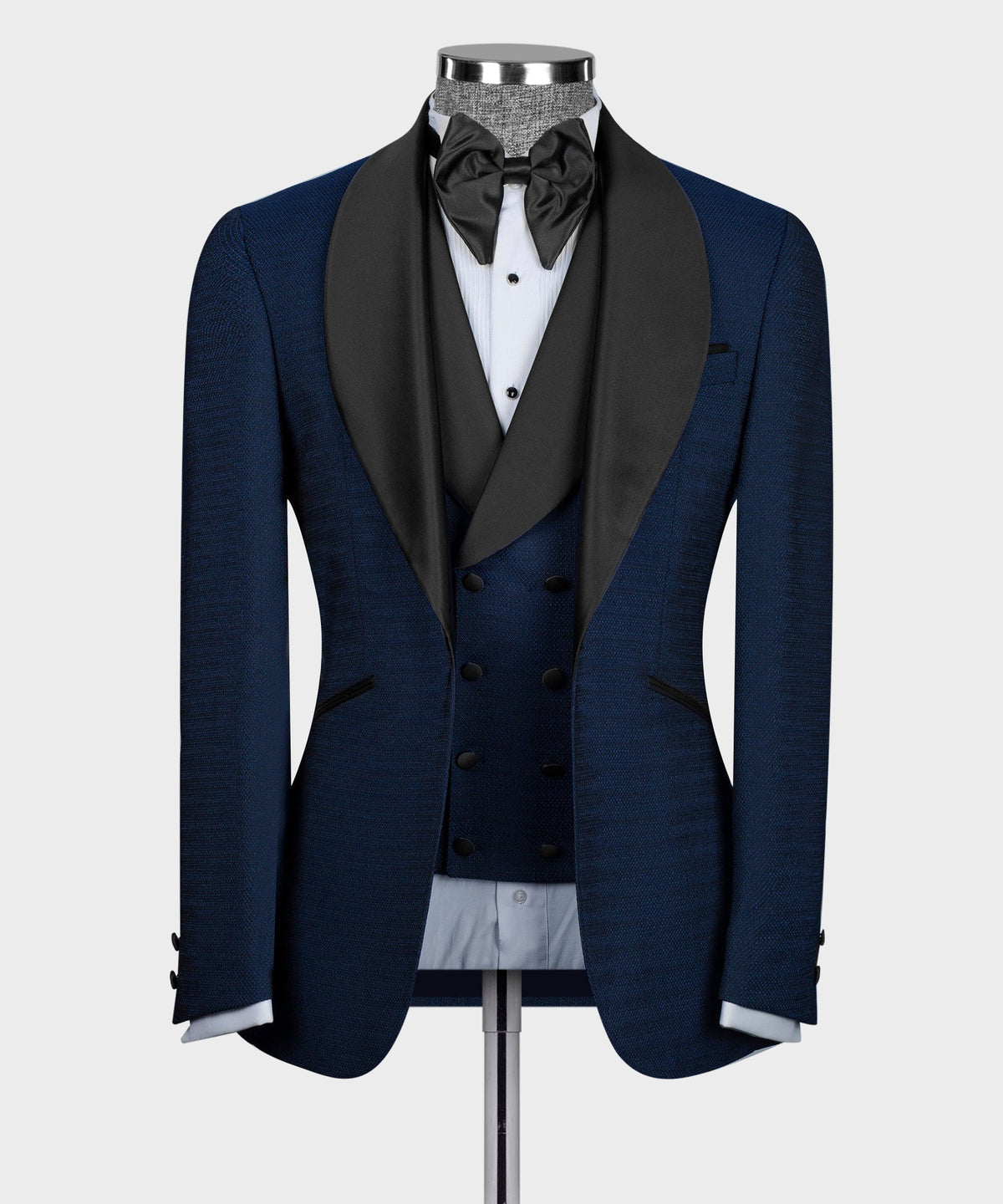 Blue tuxedo jacket with black satin lapels and bow tie, double-breasted vest
