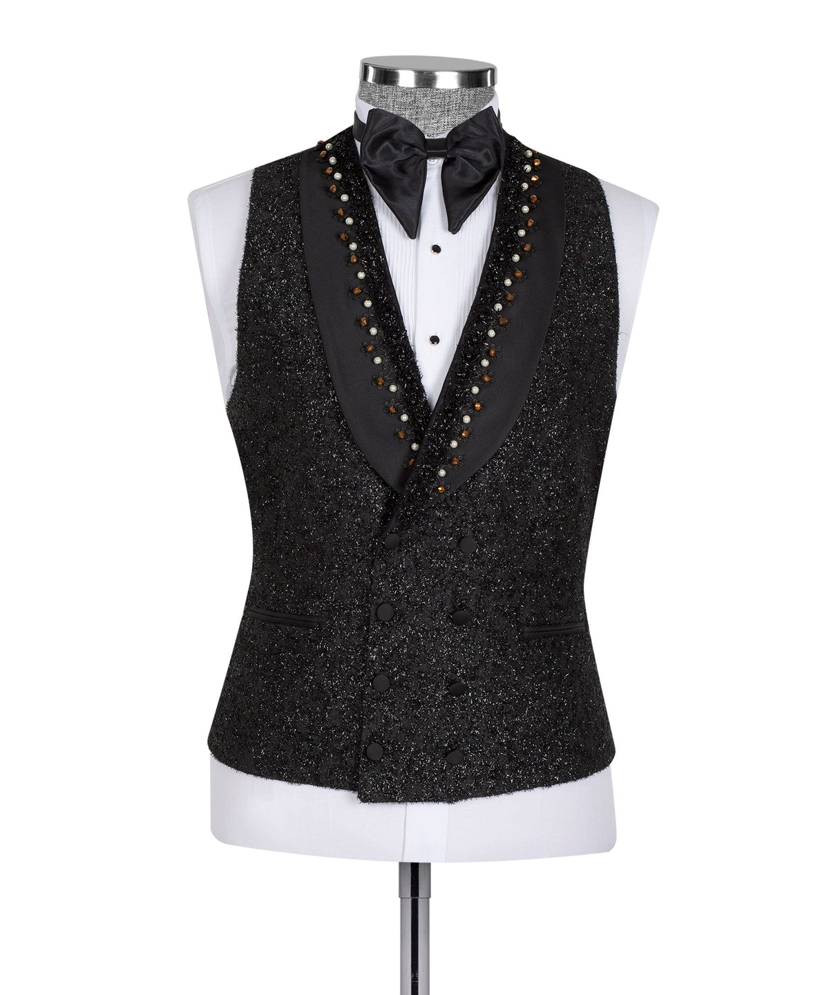 Black tuxedo vest with satin bow tie and beaded trim over white shirt on mannequin
