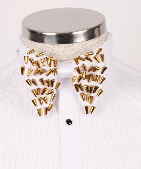 Koss Atelier white bow tie featuring scattered gold cone-shaped metal studs on a crisp white pleated tuxedo shirt.