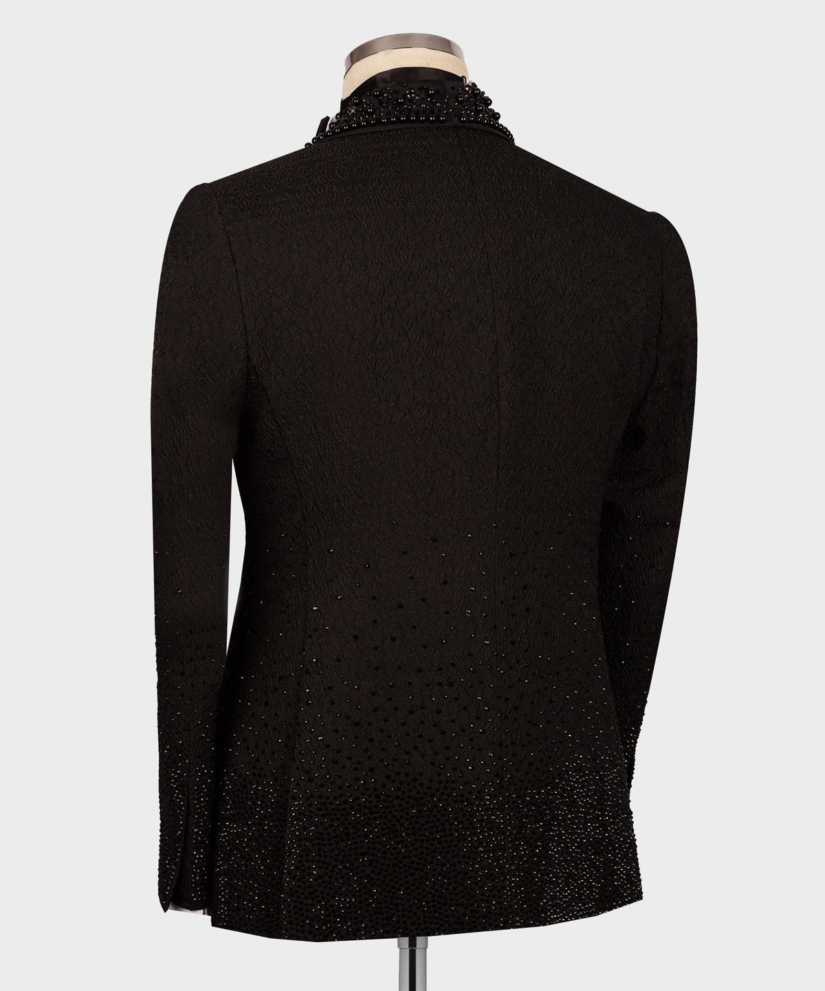 Black tuxedo jacket back view with subtle sparkle pattern