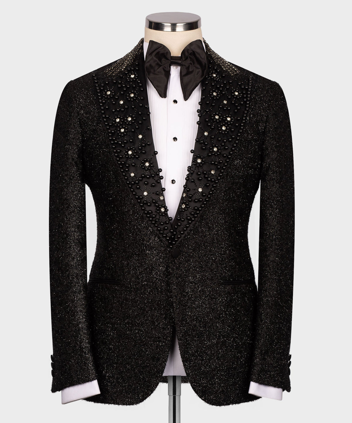 Black tuxedo jacket with sparkling beadwork panels and satin trim, peak lapels