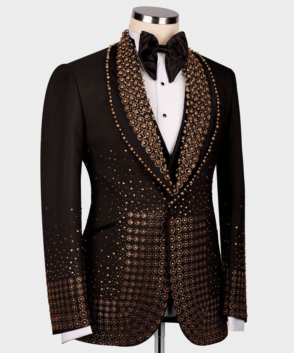Black tuxedo jacket with gold gem-like detailing along lapels and chest, front view