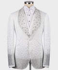 White tuxedo jacket with jeweled embellished lapel and matching black bow tie
