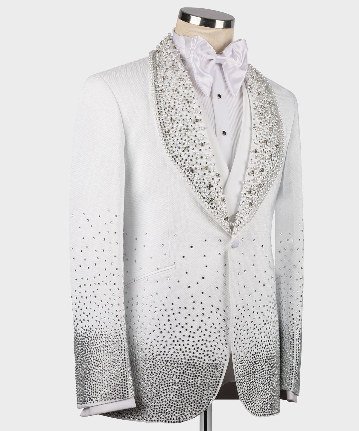 White tuxedo jacket close-up of jeweled lapel and satin bow tie
