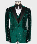 Green velvet tuxedo jacket with pearl-like studs and satin lapels
