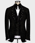 Black glitter tuxedo jacket with gemstone-style embellishments and satin black lapels