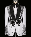 White tuxedo jacket with black floral embroidery, bead-dotted pattern and satin lapels