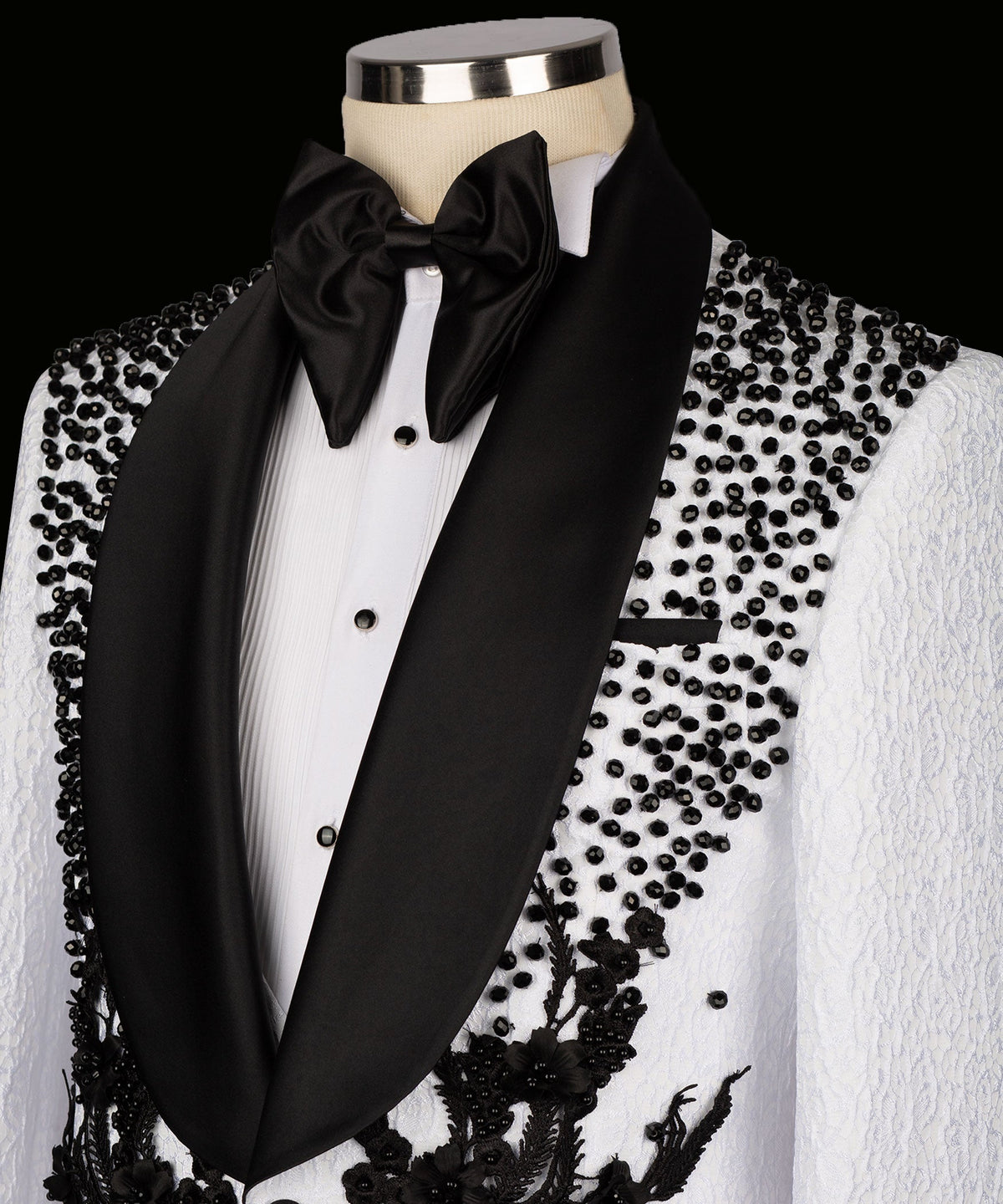 White tuxedo jacket with black satin lapel and bow tie, floral embroidery and beadwork