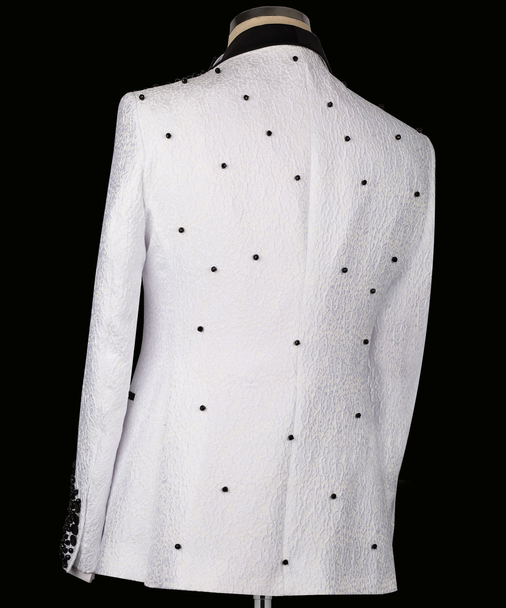 White tuxedo jacket back with scattered black bead accents, smooth textured fabric