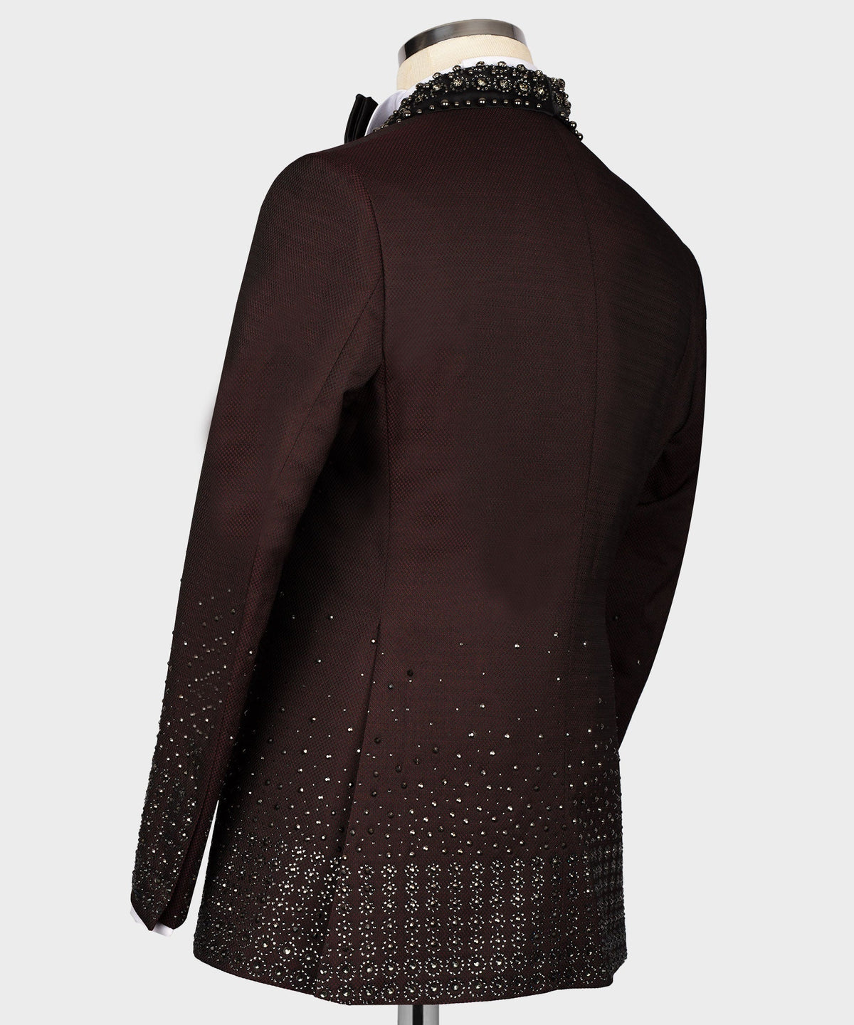 Back view of burgundy tuxedo jacket with scattered rhinestone dots along the hem
