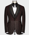 Burgundy tuxedo jacket with round lapels, jeweled black satin trim and black button front
