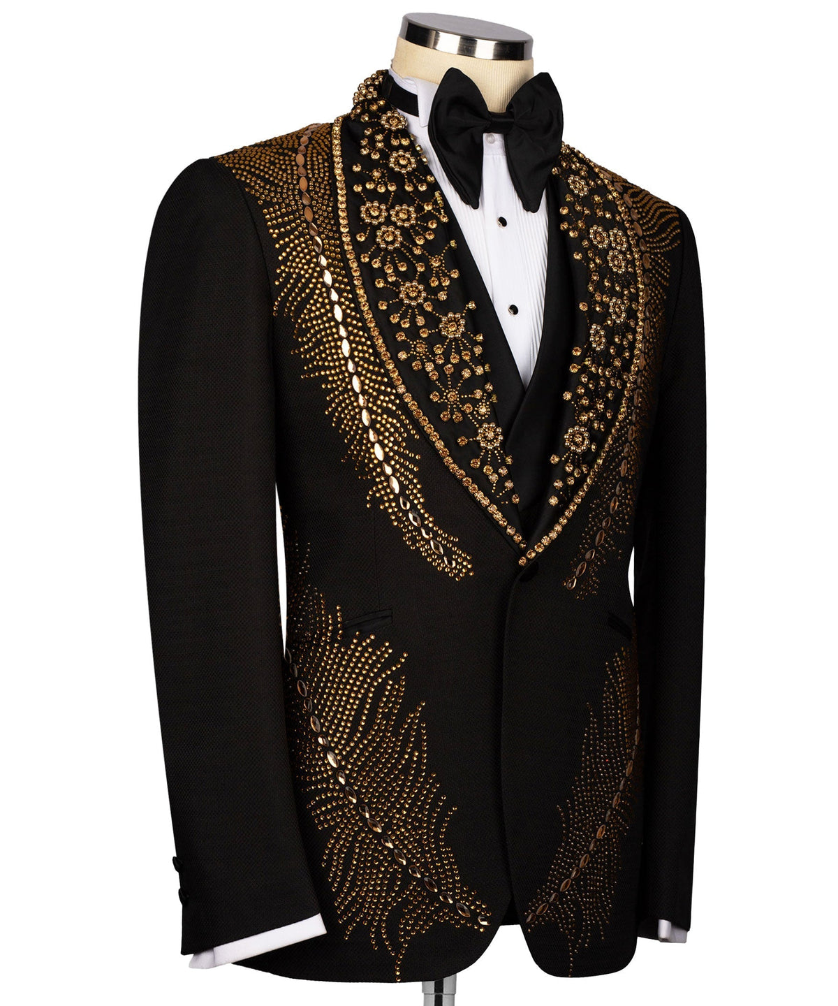Black tuxedo jacket with gold stone-embellished lapels and matching black bow tie