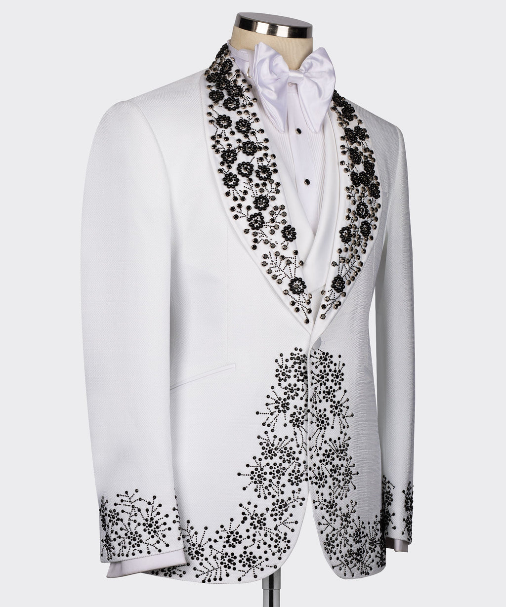 White tuxedo jacket side view, black beaded gemstone embroidery along lapels and front