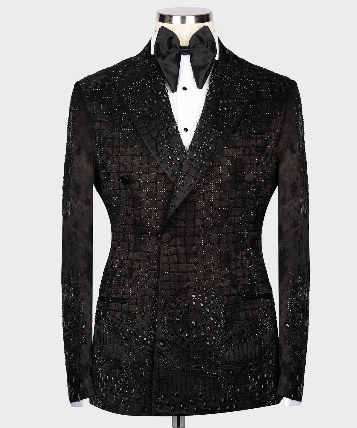 Black embroidered tuxedo jacket with satin bow tie and white shirt front