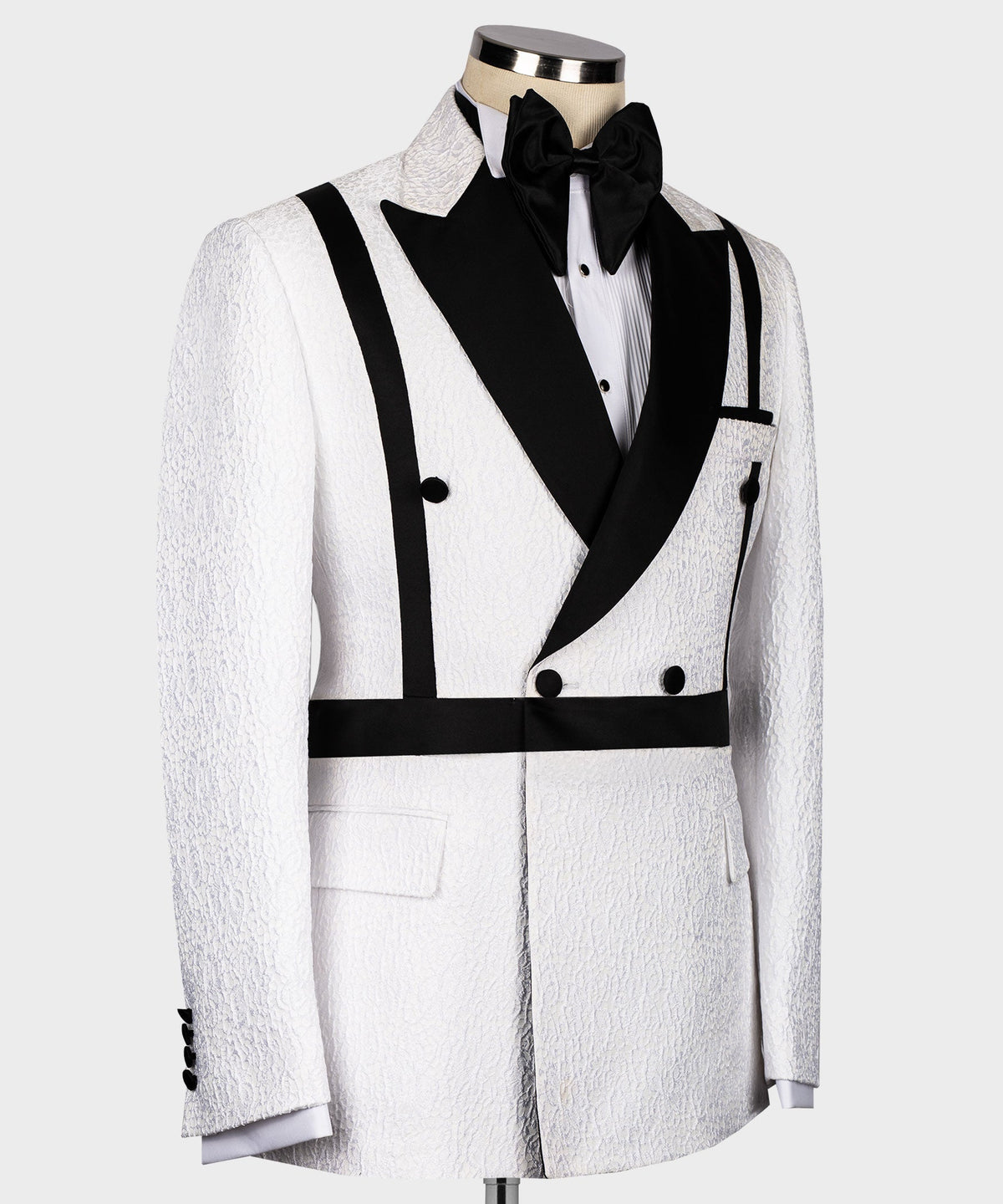 Double-breasted black-and-white tuxedo jacket with satin lapels, bow tie and waistcoat