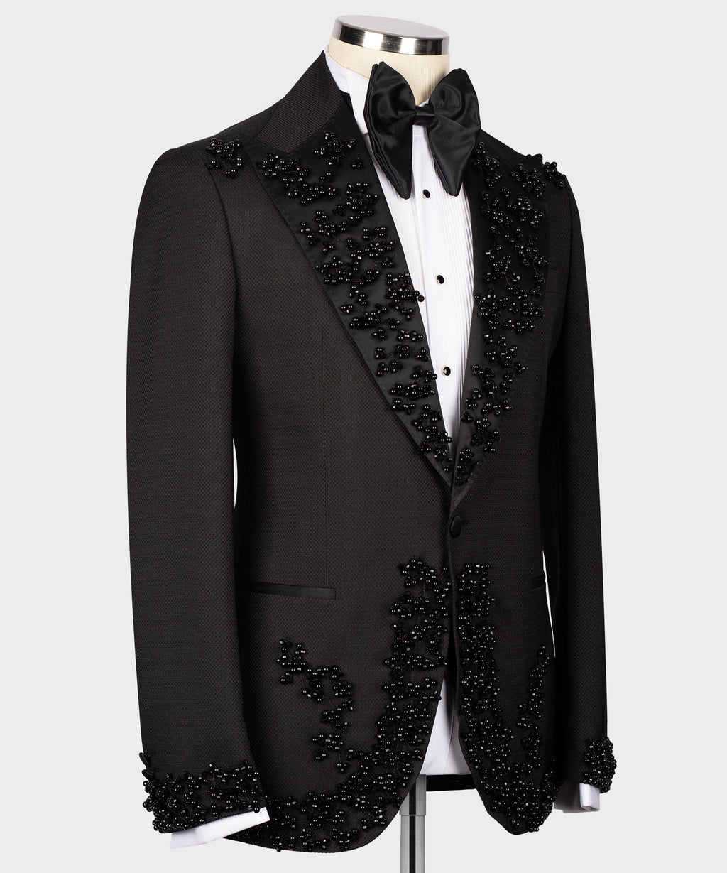 Black tuxedo jacket with embellished V-shaped vest front and satin bow tie
