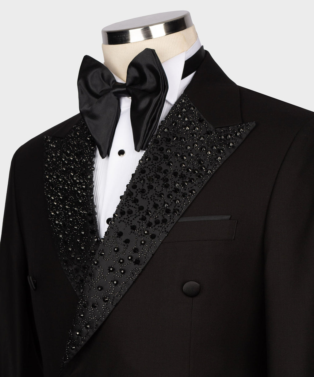 Black tuxedo bow tie and white shirt front with gemstone-embroidered satin vest panel
