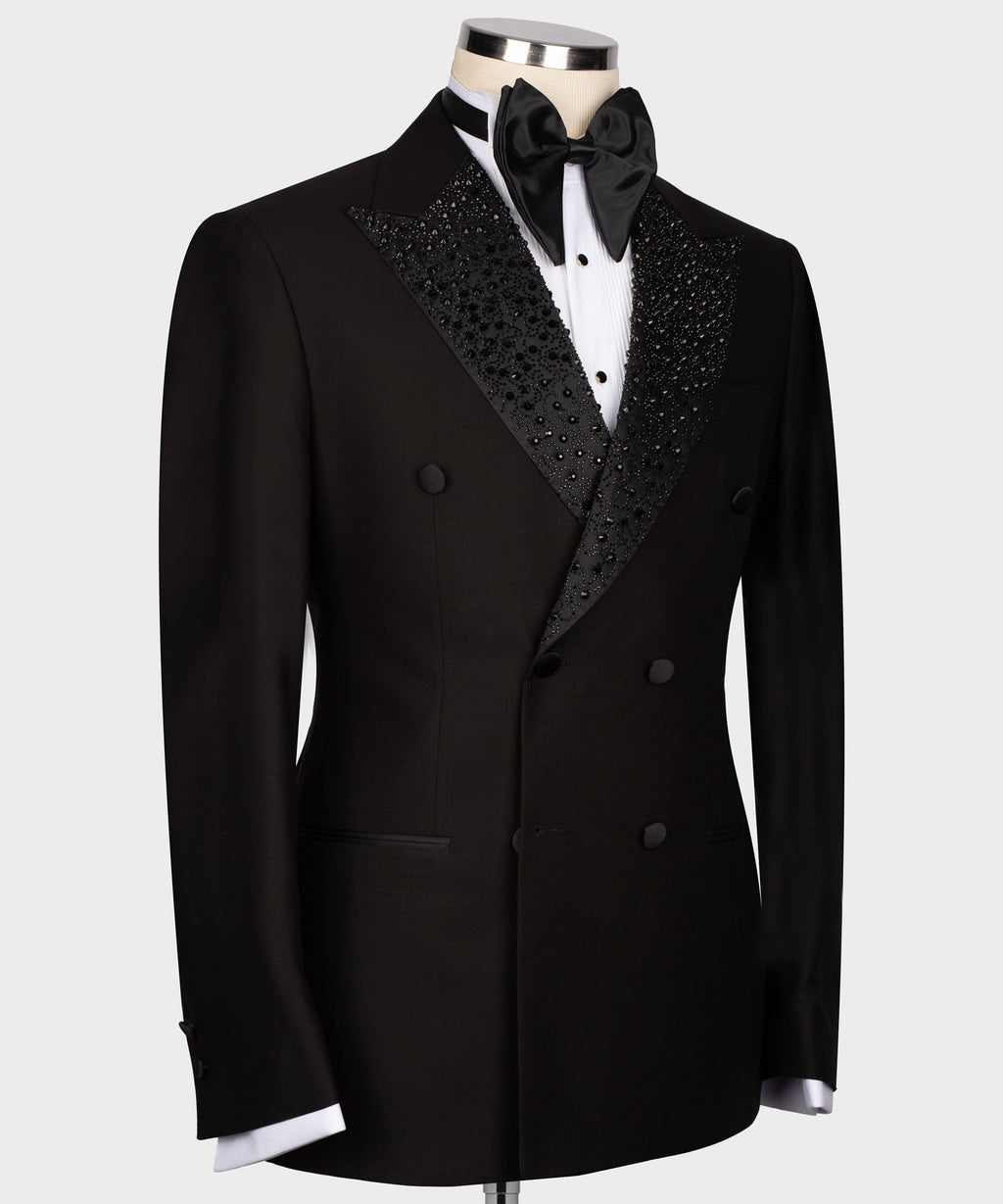 Black tuxedo jacket with rhinestone lapel detailing and satin bow tie