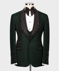Dark green tuxedo jacket with black beaded lapels, bow tie, and white shirt