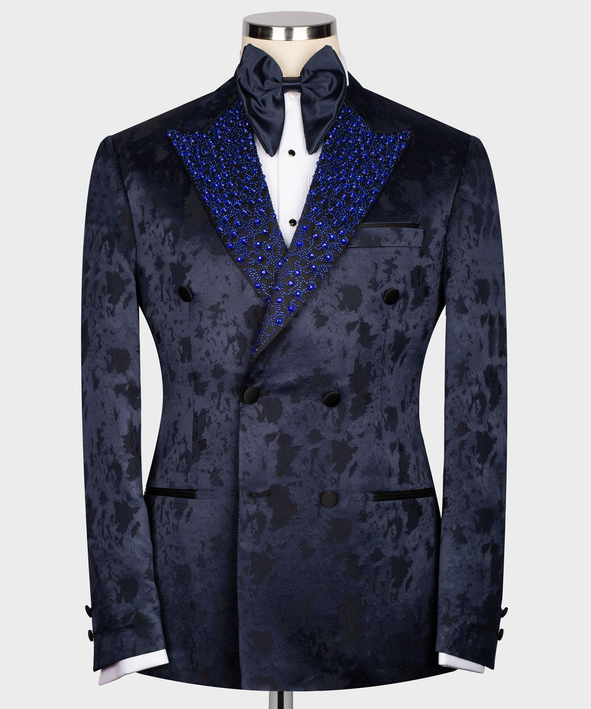 Navy double-breasted tuxedo jacket with blue sequin lapel and satin bow tie