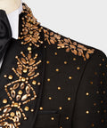 Black tuxedo lapel with gold floral beadwork and bronze-toned sequin details