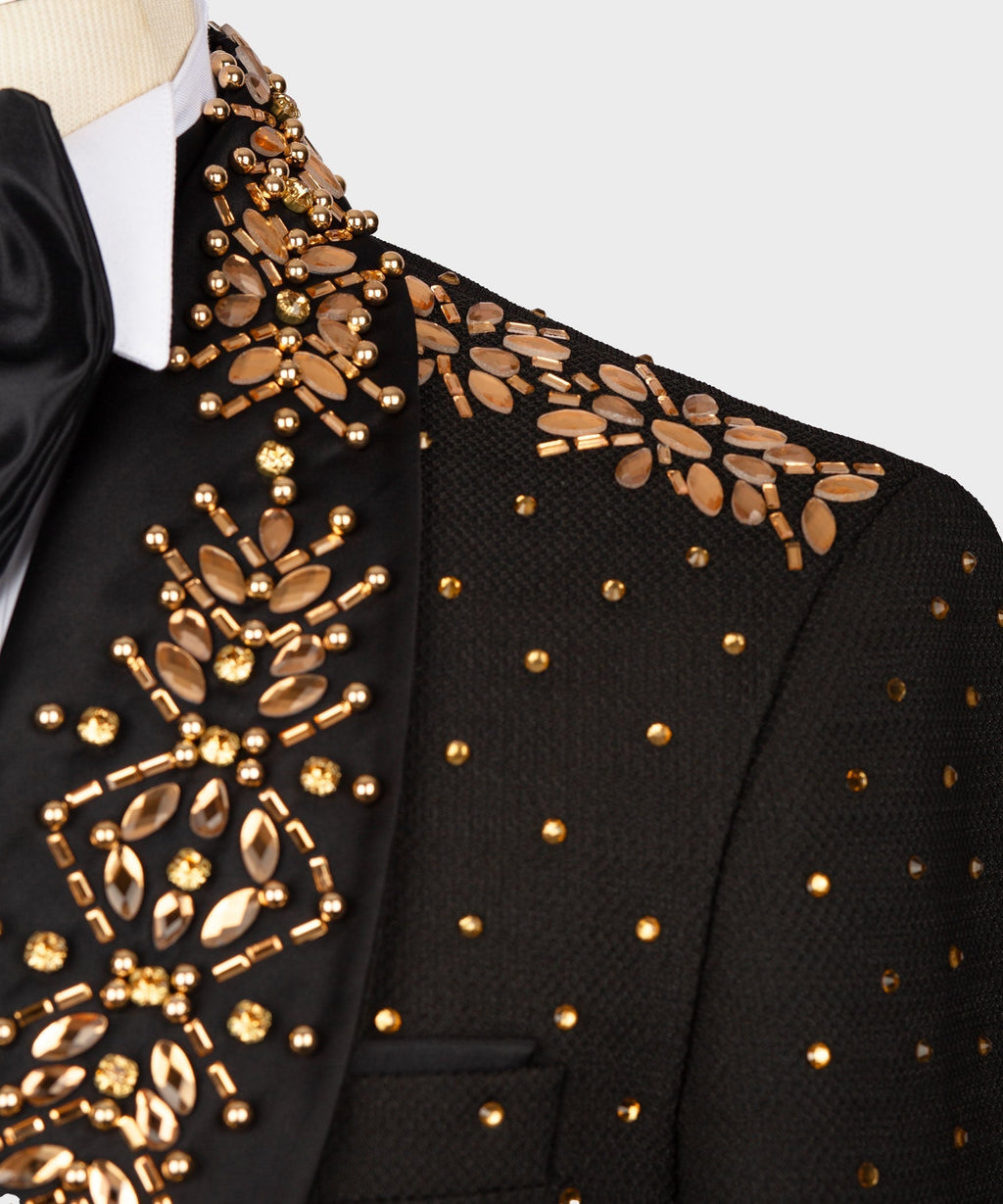Close-up: black tuxedo jacket with gold bead and sequin floral appliqués
