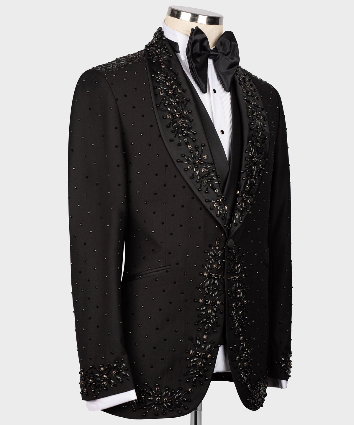 Black tuxedo jacket side view with dotted bead pattern and jeweled lapel appliqués