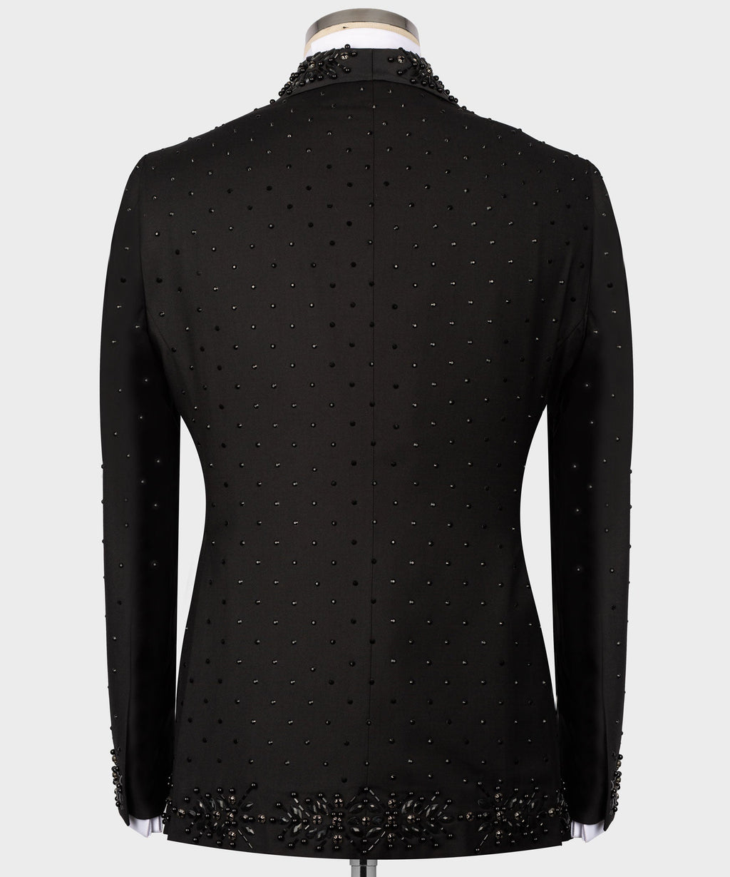 Black tuxedo jacket back view with scattered bead details and vented hem