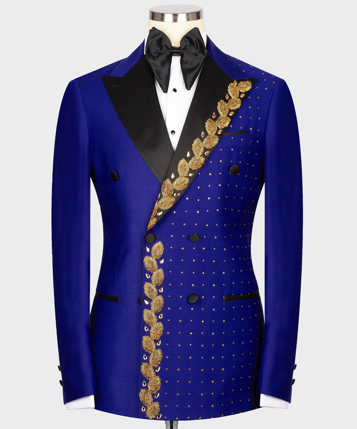 Royal blue tuxedo jacket with gold leaf trim and dot pattern, black satin lapels