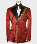 Red patterned tuxedo jacket with black satin lapels and gold embroidered diagonal trim