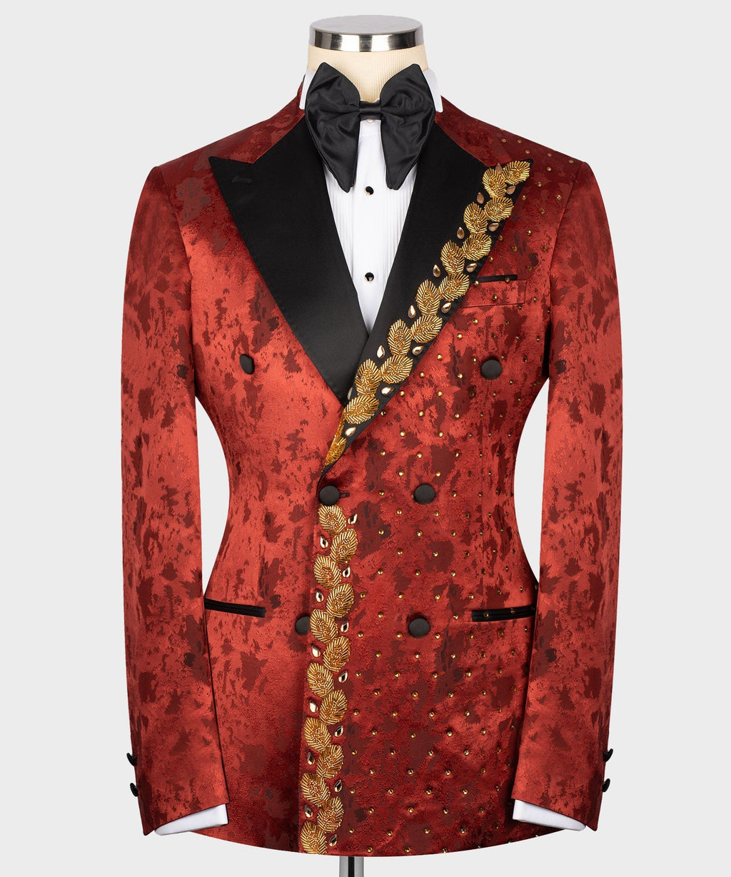 Red patterned tuxedo jacket with black lapels, bow tie, and gold embroidered trim