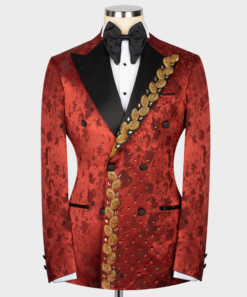 Red patterned tuxedo jacket with black lapels, bow tie, and gold embroidered trim