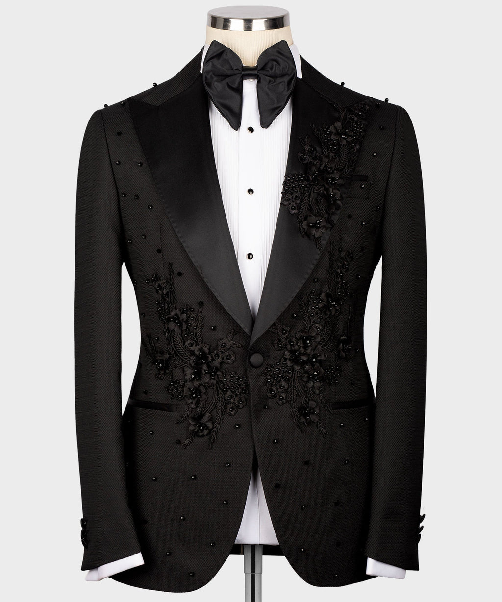 Black tuxedo set with bow tie, vest, and jacket featuring scattered dot studs