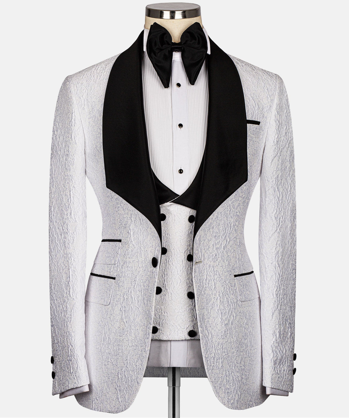 White and black embossed tuxedo jacket with satin black lapels and bow tie