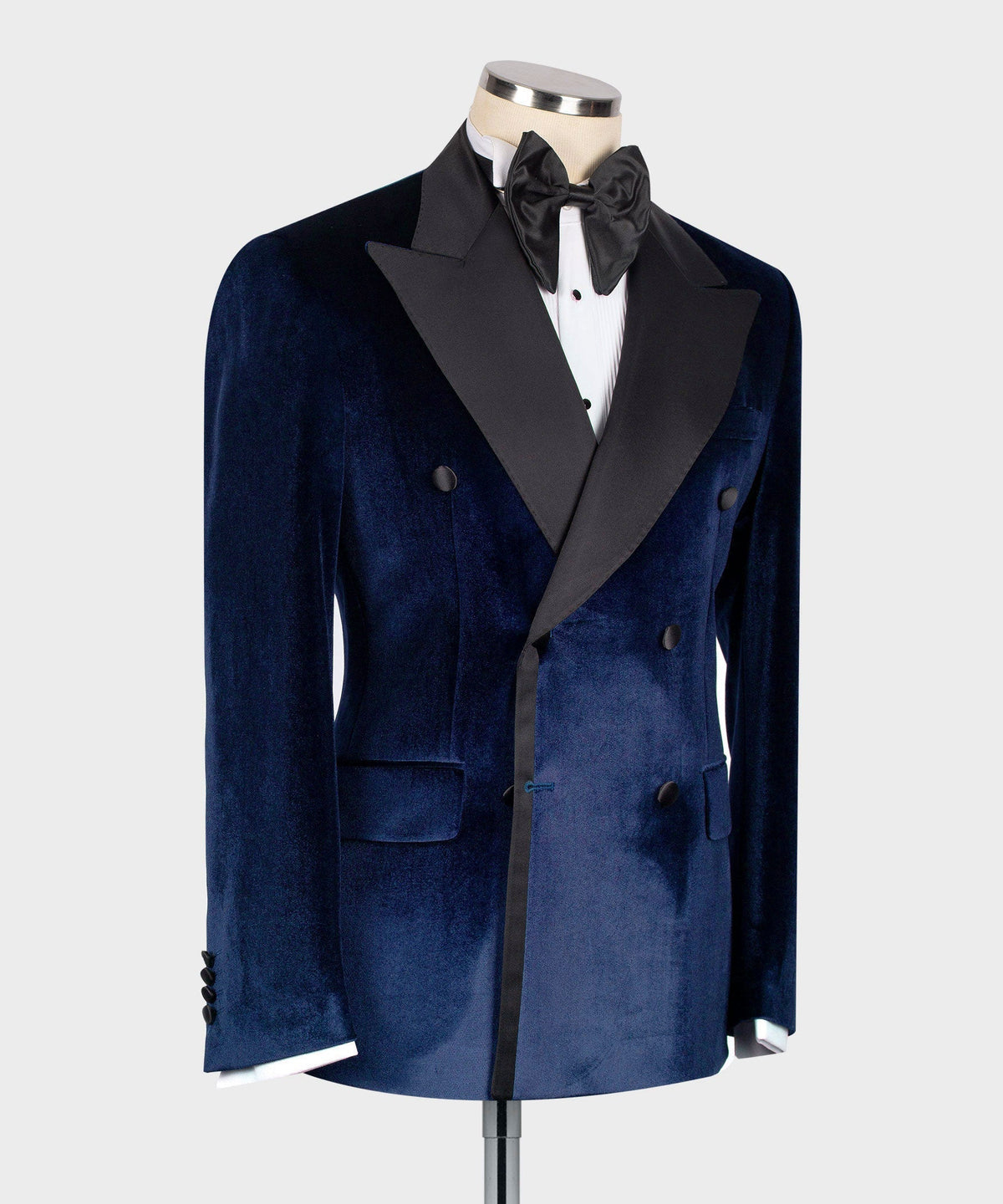 Blue velvet double-breasted tuxedo jacket with black satin lapel and button front