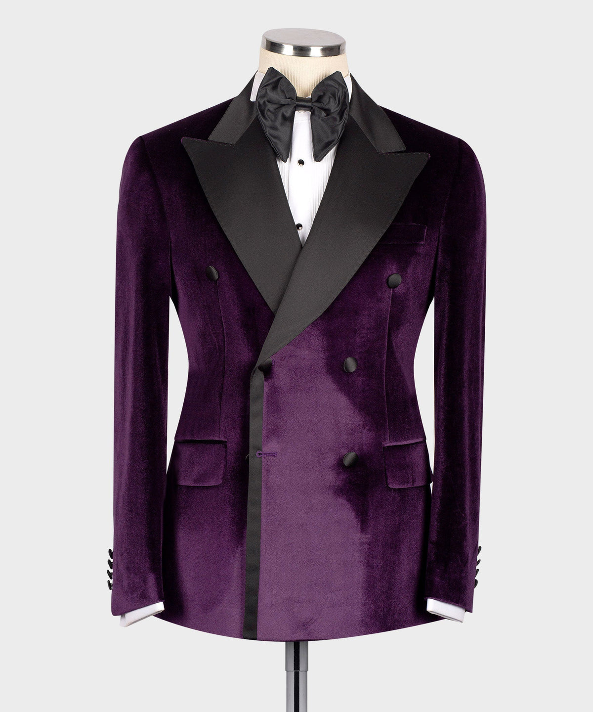 Purple velvet double-breasted tuxedo jacket with black satin lapels and bow tie