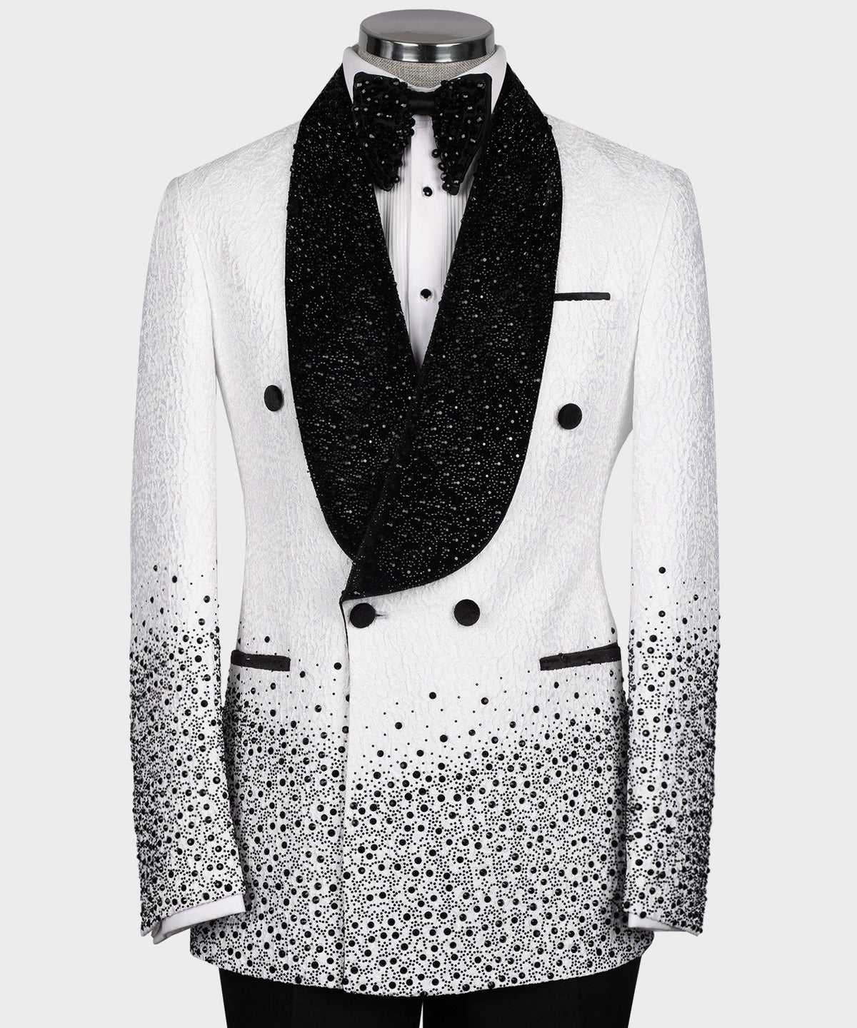 White tuxedo jacket with black stone-embroidered shawl lapels and bow tie detail