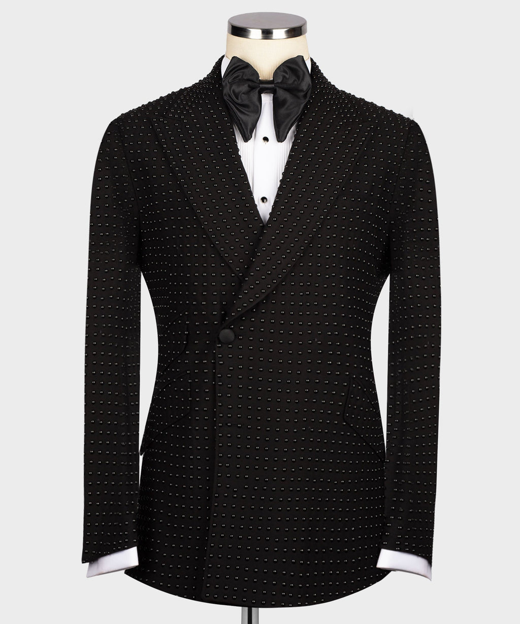 Black tuxedo jacket with stone-studded pattern, satin bow tie and notch lapels