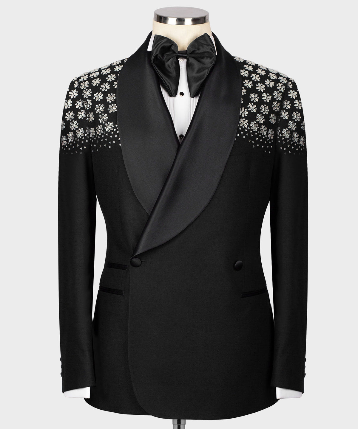Men's black tuxedo jacket with stone-embellished floral embroidery on shoulders and sleeves