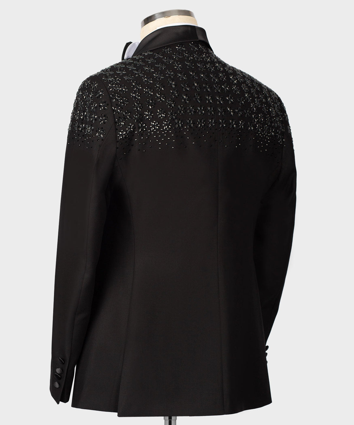 Black tuxedo coat back with allover stone-embroidered texture