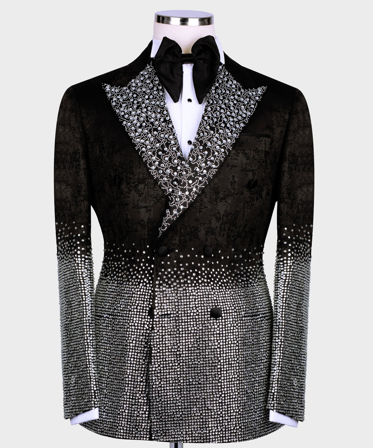 Black tuxedo jacket with silver gemstone-embroidered peak lapels and satin bow tie