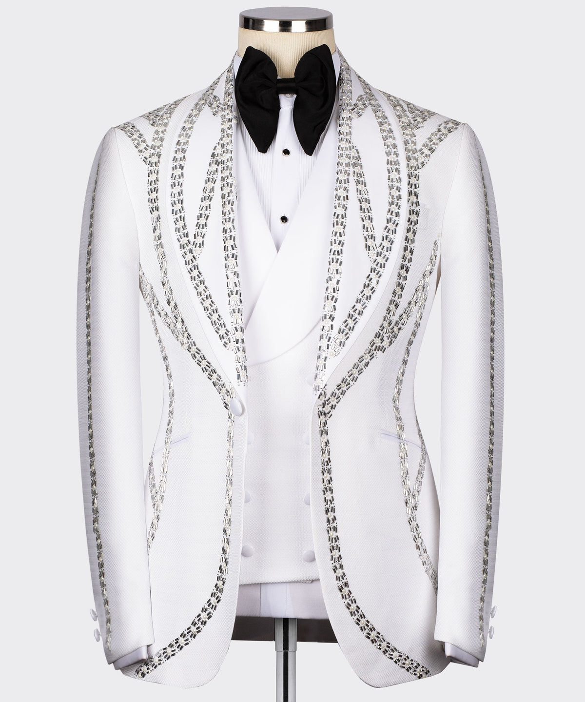 White tuxedo jacket with silver-toned embroidered front, satin lapels, black bow tie