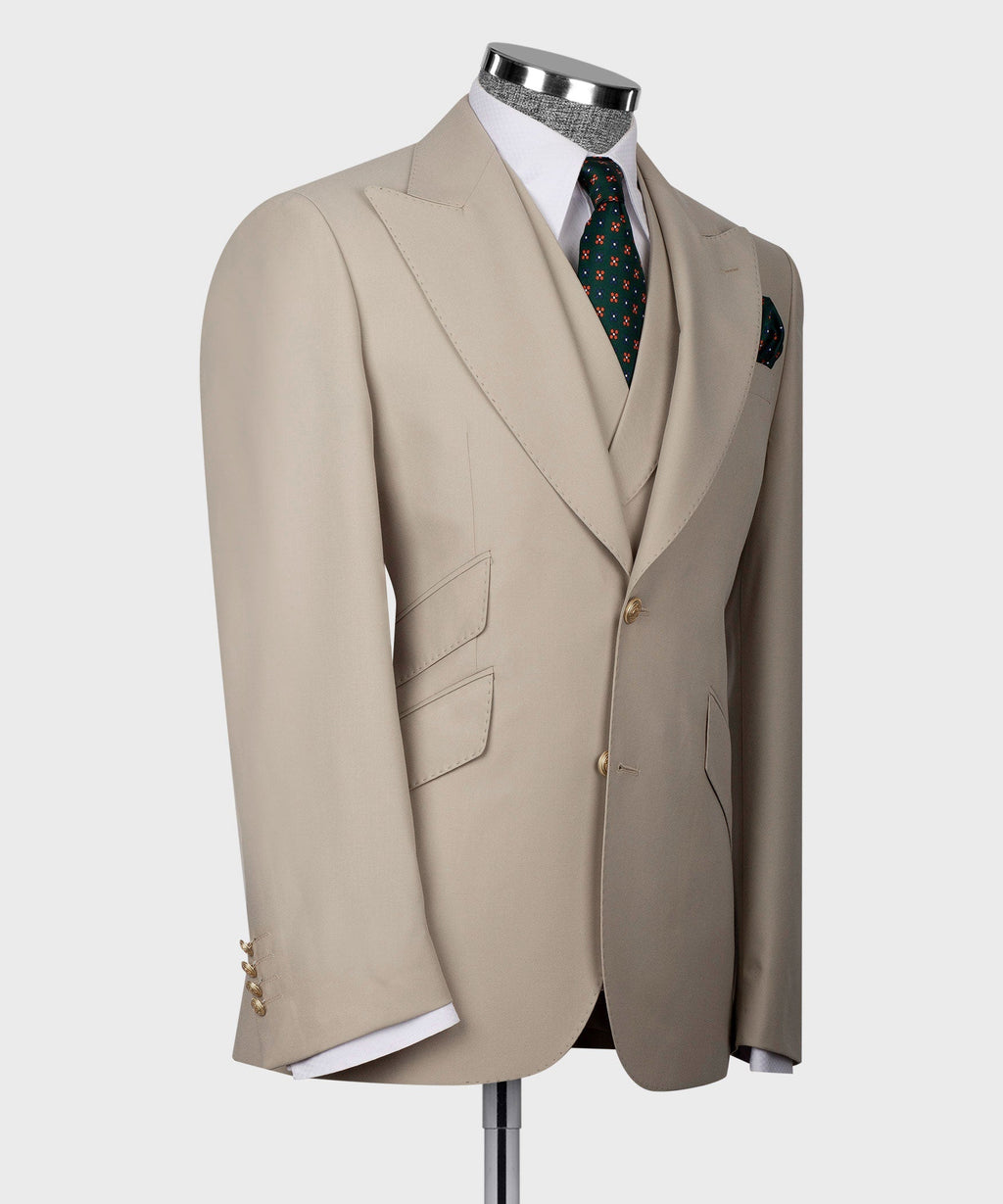 Cream vest suit jacket side view on mannequin, gold button closure and flap pockets
