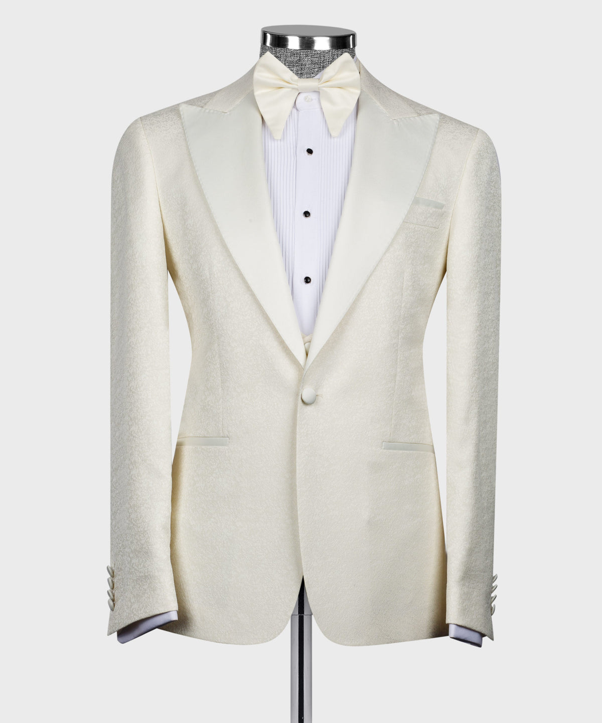 Cream tuxedo jacket with notch lapels and matching vest, white striped shirt