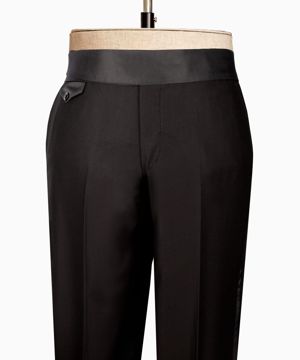 Black tuxedo trousers with crease lines and front slanted pockets